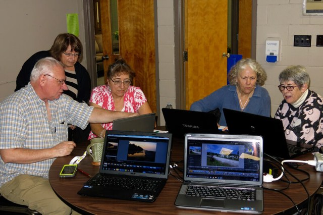 One-on-one, peer-to-peer instruction at it's best! Photo by Rob Cotton